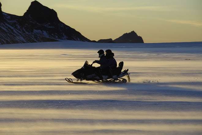 Midnight Sun & Snowmobiling from Húsafell